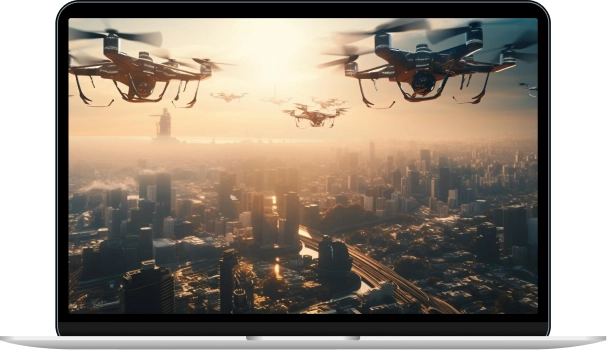 Laptop displaying an image of drones